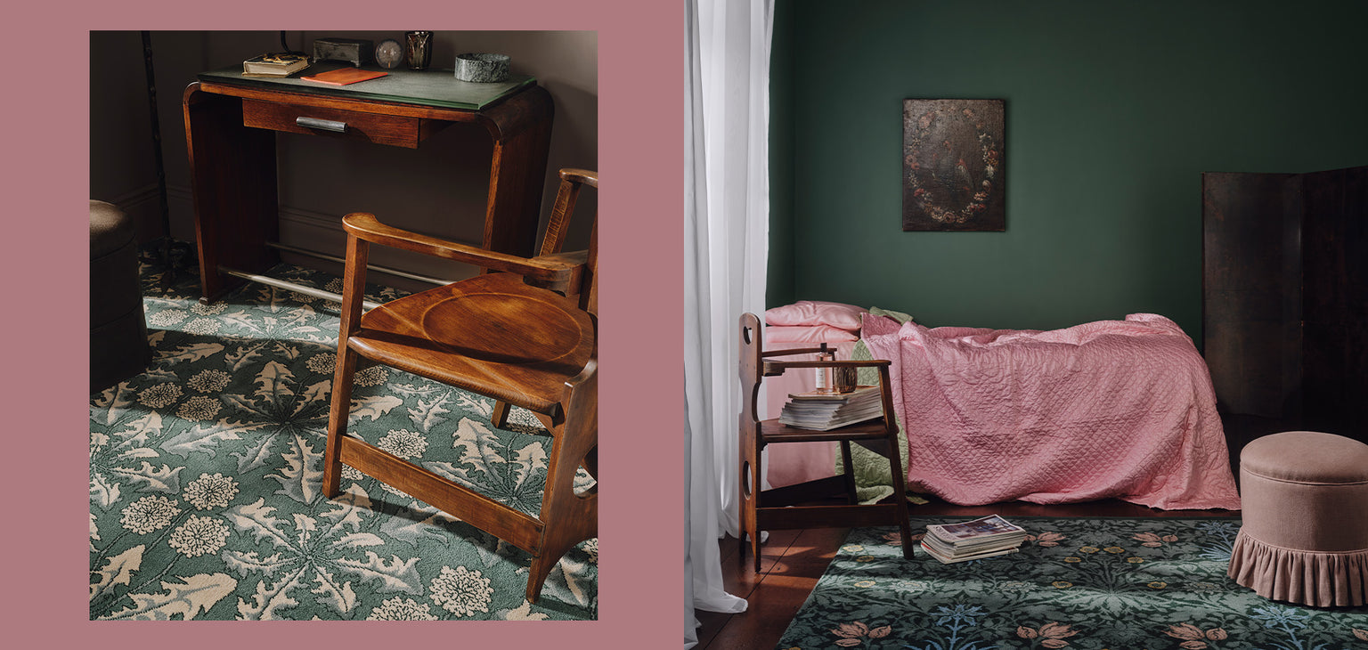 a room with a pink bed and a chair