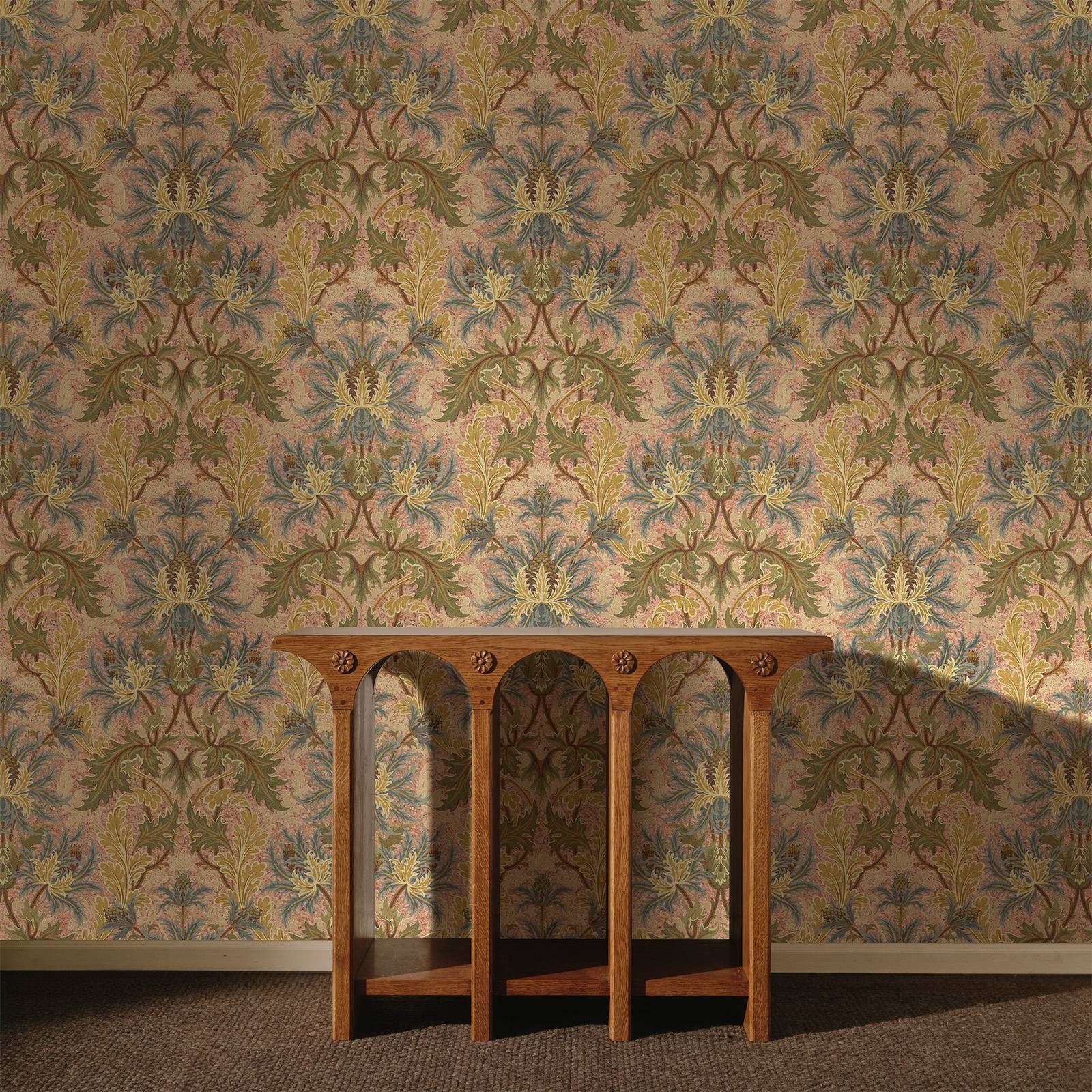 a wooden table in front of a wall