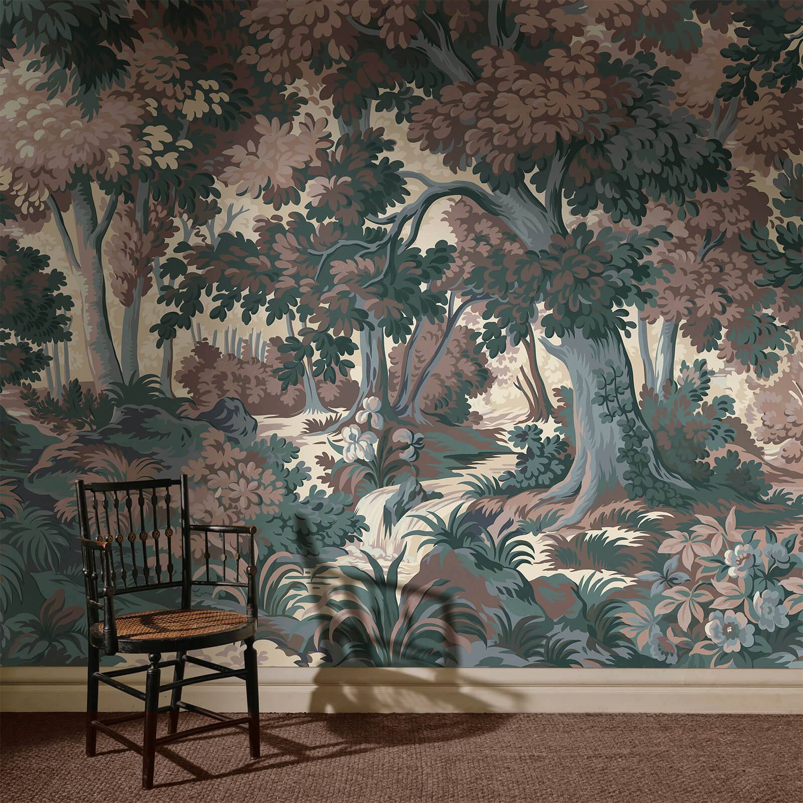 a chair in front of a wallpaper