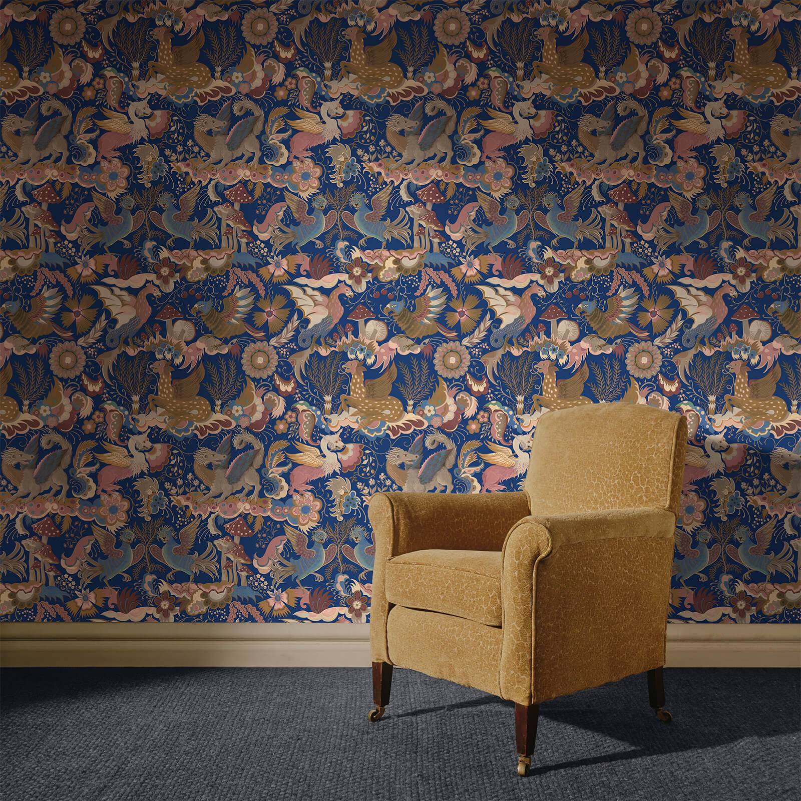 a chair in a room with a wallpaper