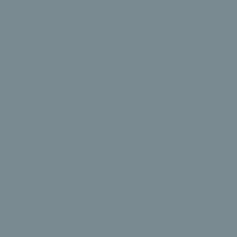 a blue surface with white spots
