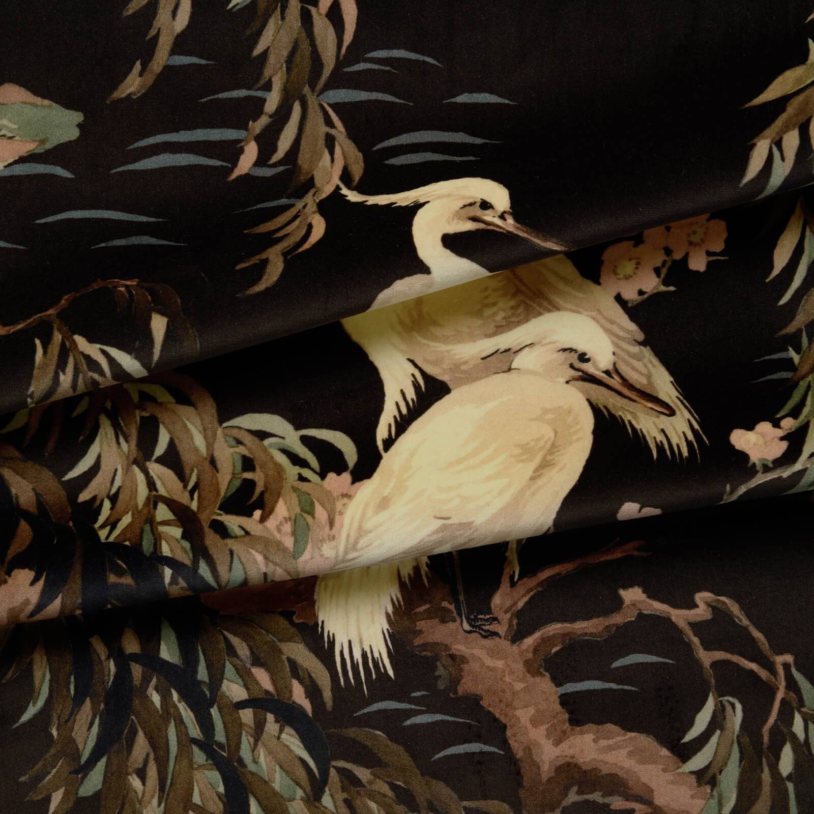 a fabric with birds on it