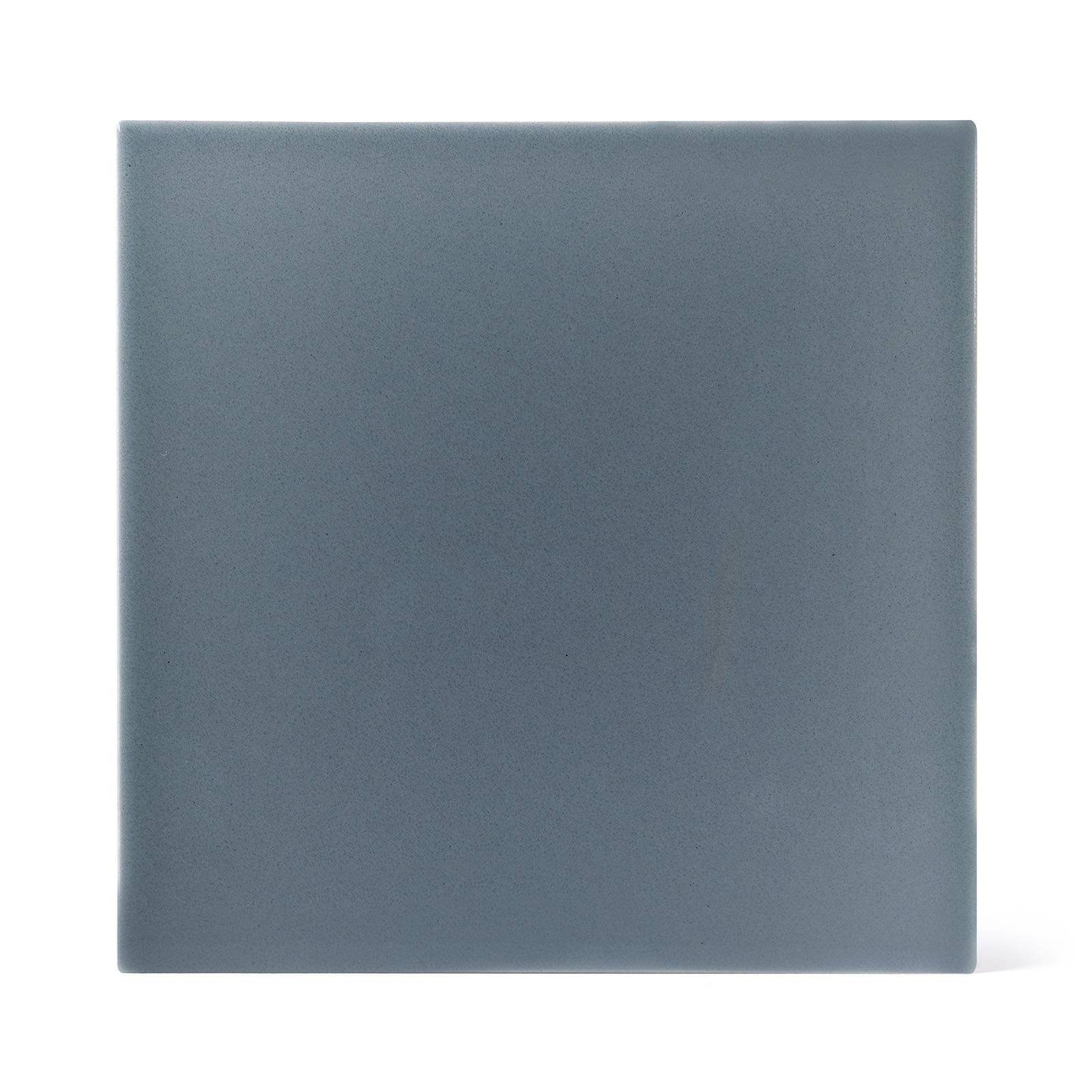 a grey square object with a white background