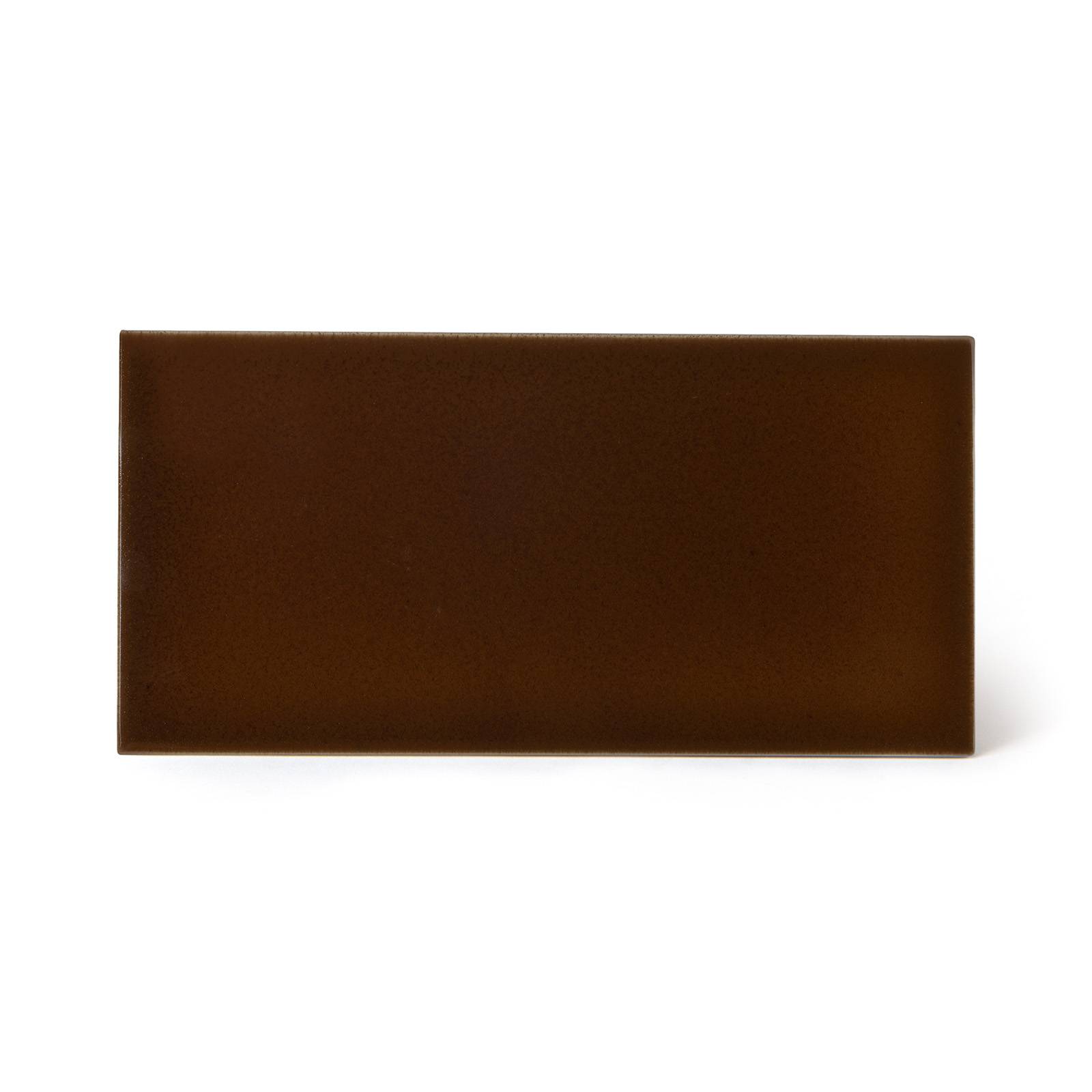 a brown rectangular object on a white background