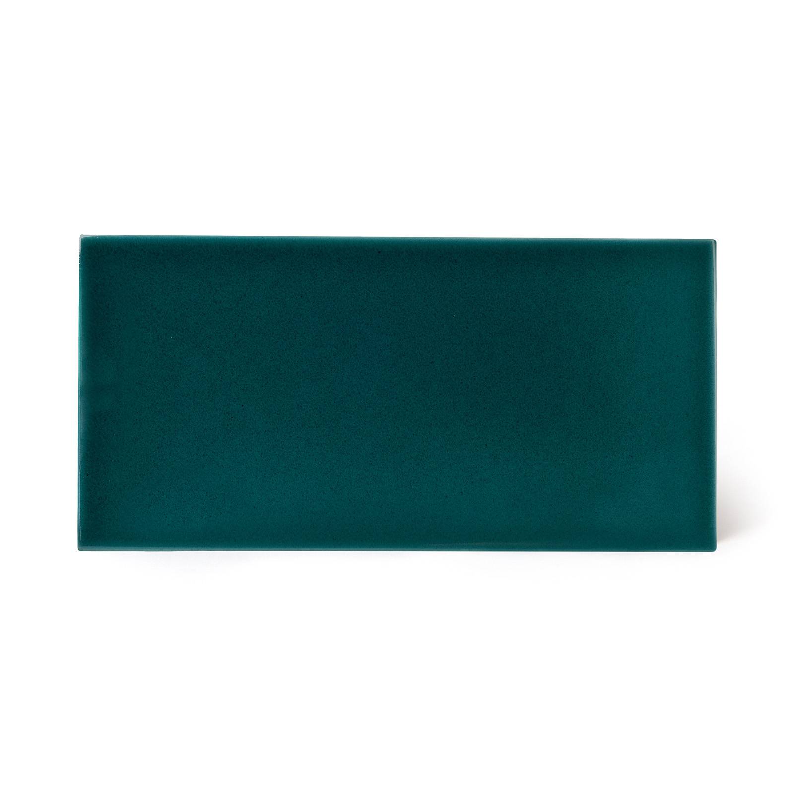 a close up of a green rectangular object