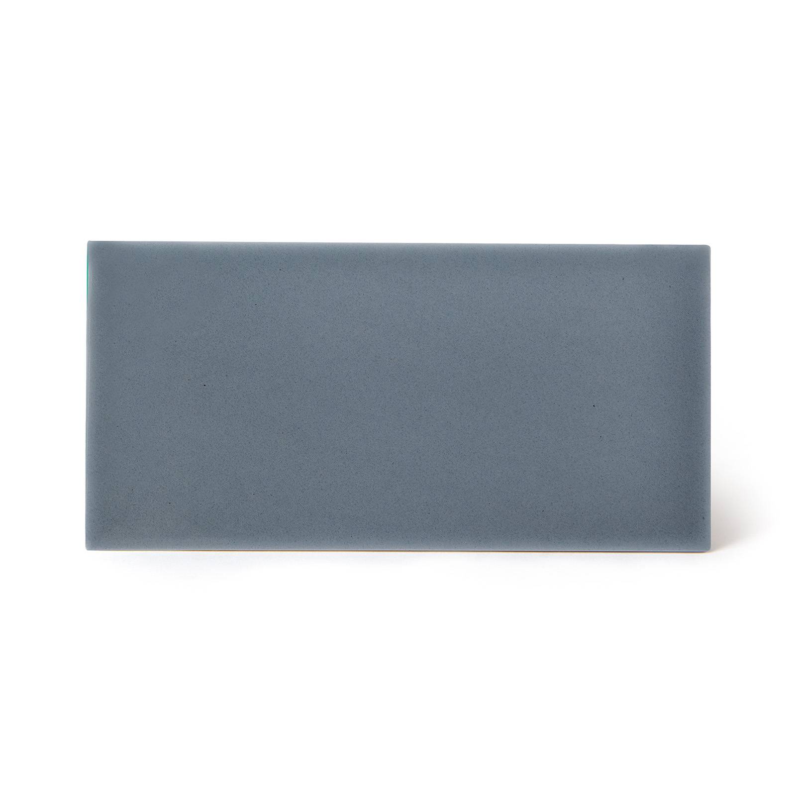 a grey rectangular object on a white background